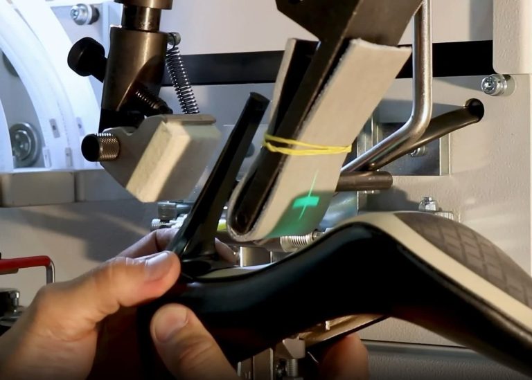 heel nailing machine reinforcing formal footwear heel in manufacturing factory