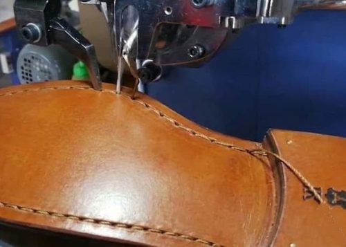 Leather Outsole stitching operation.