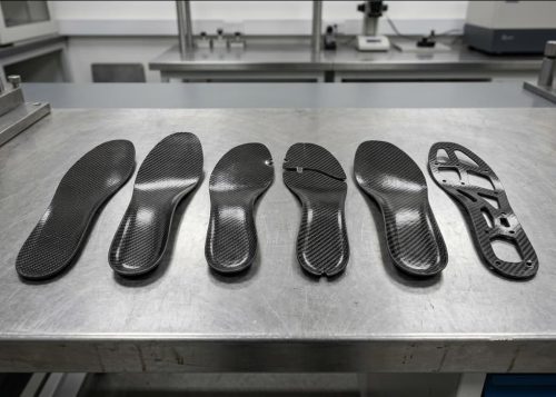 Different carbon-fiber plate designs used in footwear construction