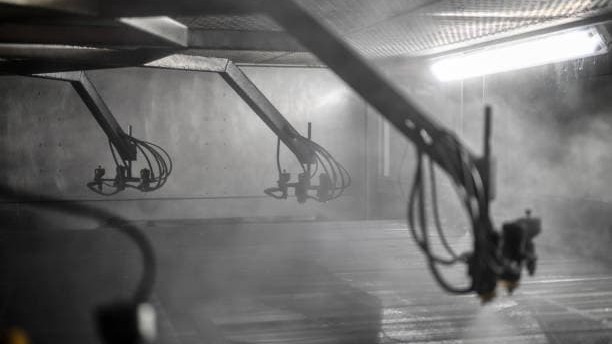 Leather being processed in a finishing department at a tannery